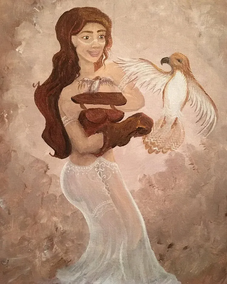 She trains the baby Falcon, in this picture we witness the baby falcon learning commands like its moma.
