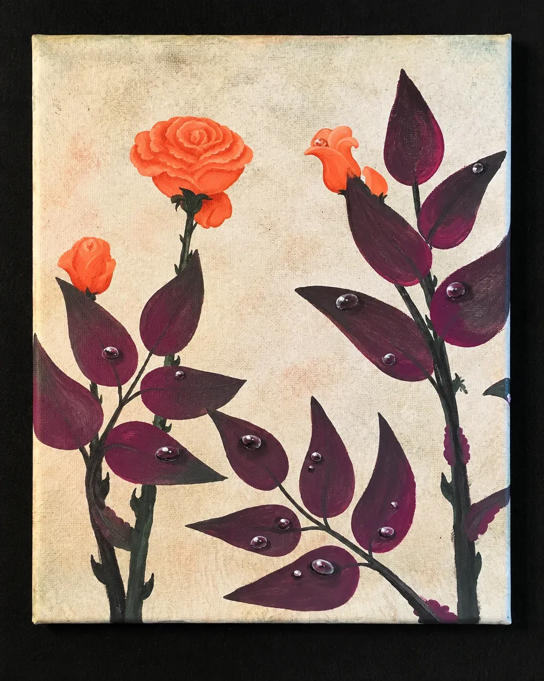 Orange toned roses and their thorny stems, purple tones leaves dotted with dew drops.